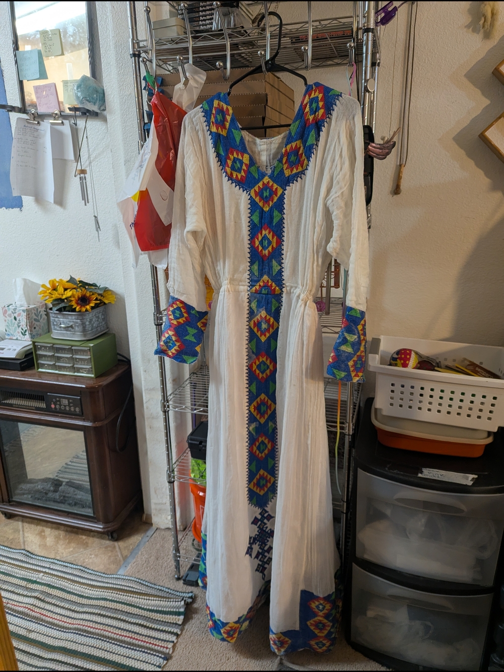 traditional Ethiopian or Eritrean Habesha kemis dress featuring vibrant multicol